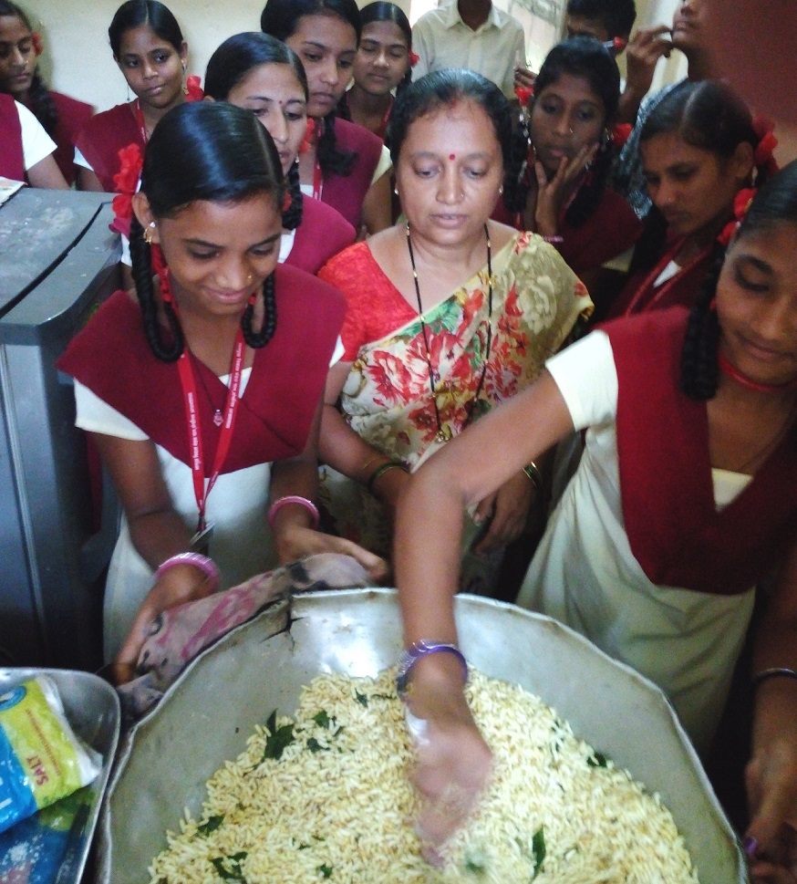 Making chivda (snack)