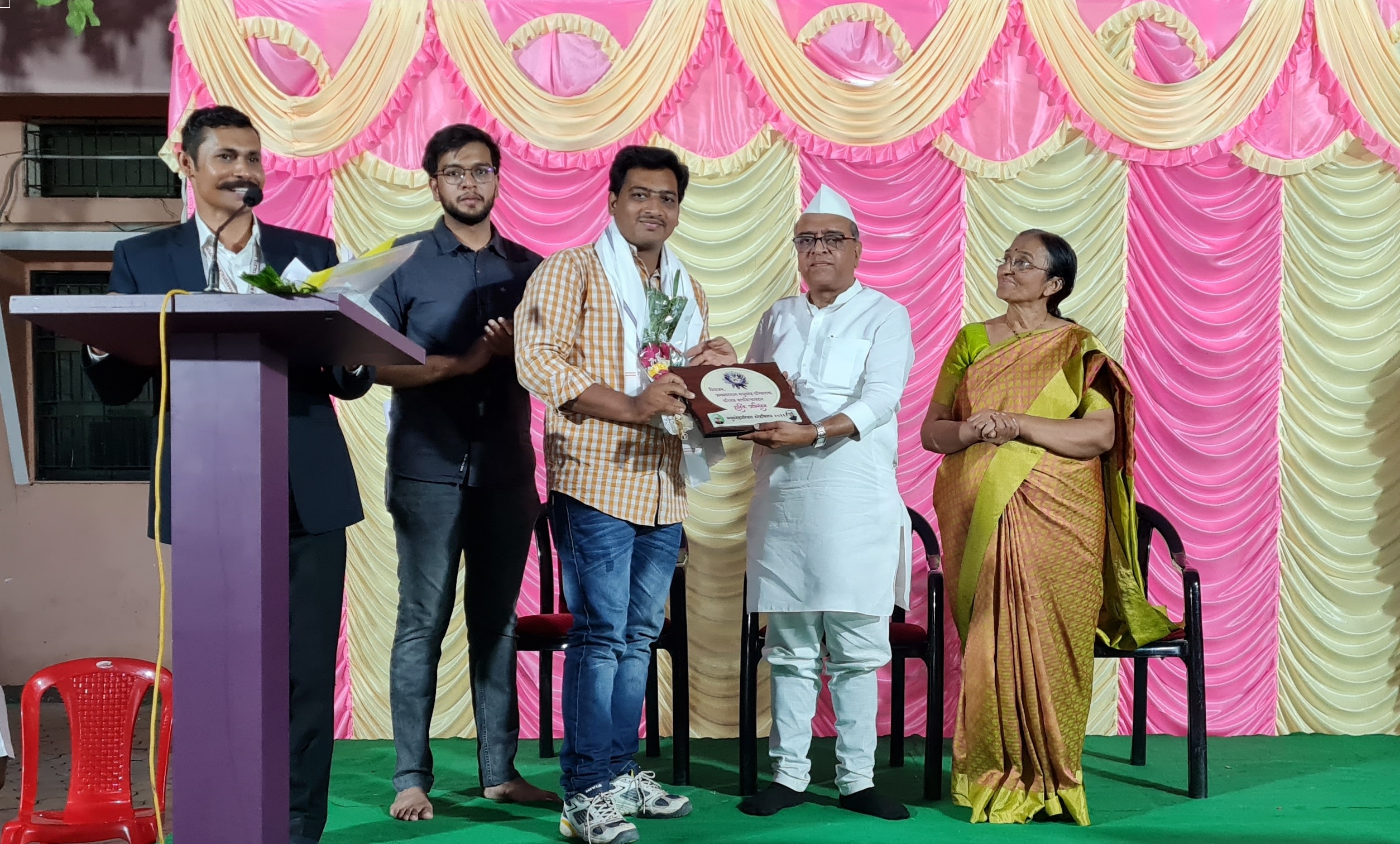 Honour at the hands of Hon. Shri Shirishdada Chaudhari